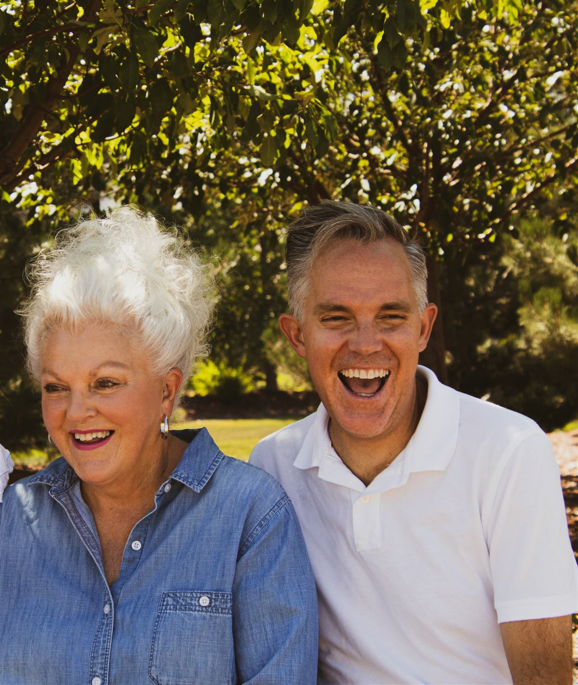 A mother and adult son laughing together
